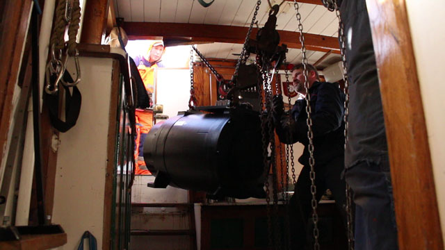 A system of hoists was used to lower the motor