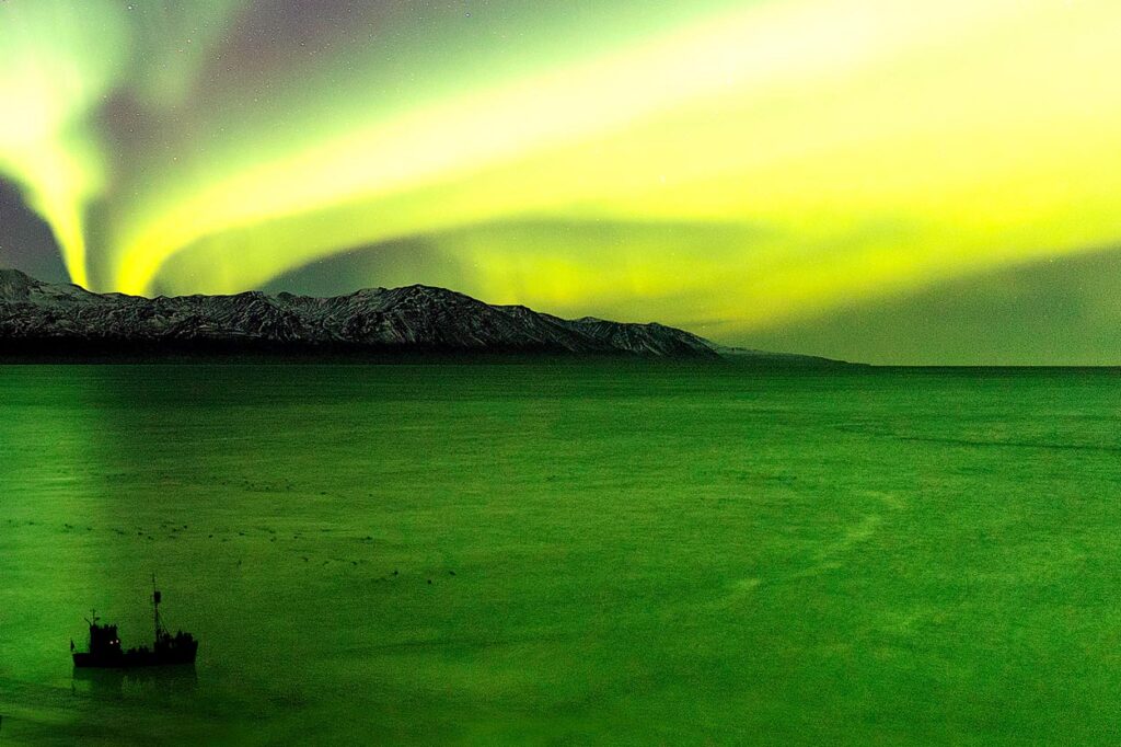 Best time to see the Northern Lights in Iceland is during the winter time. Here you can see Northern Lights from a boat in Húsavík