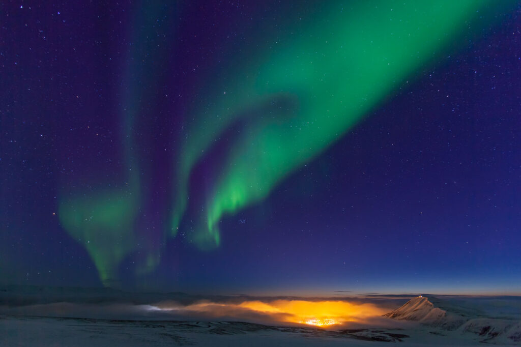 Strong Northern Lights Over Húsavík, Iceland, Where the Nature Baths Will Be Located