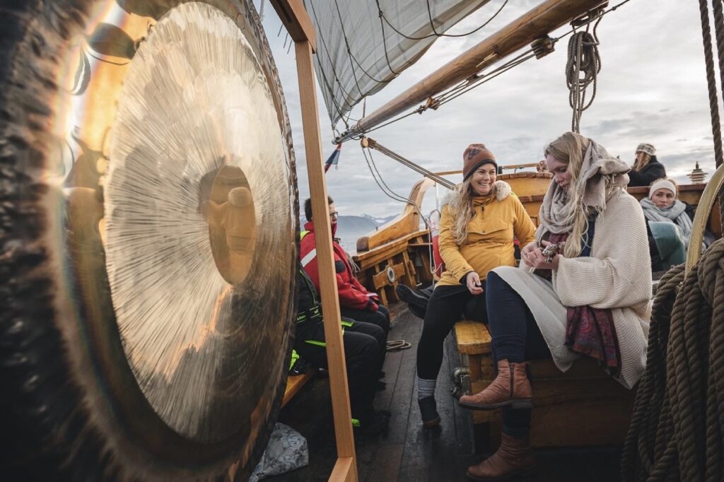 Meditation onboard wooden sailboat