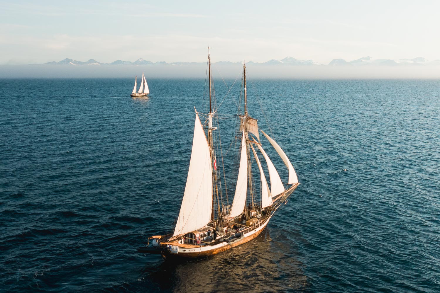 Schooner Opal East Greenland Schooner Opal and sailboat Tilvera in East Greenland.