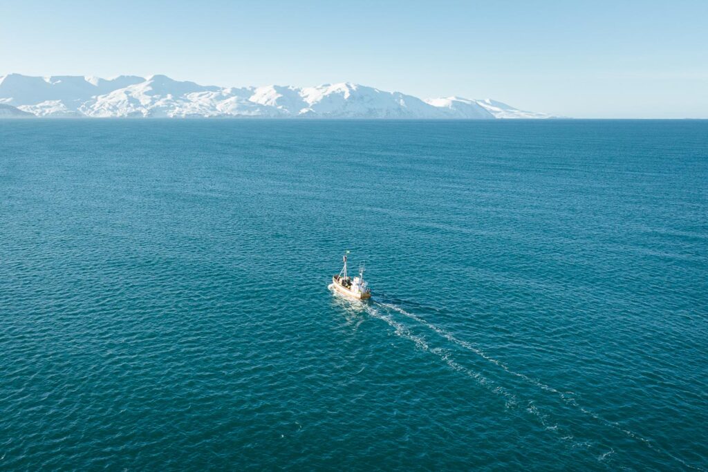 Bjössi Sör sailing out on bluebird day.